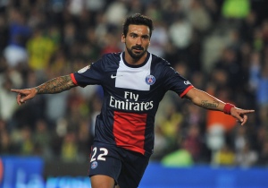 Paris Saint-Germain's Argentinean forward Ezequiel Lavezzi celebrates after scoring a goal during the French L1 football match between Nantes and Paris Saint-Germain (PSG) on August 25, 2013, at La Beaujoire stadium in Nantes, western France. AFP PHOTO / FRANK PERRY        (Photo credit should read FRANK PERRY/AFP/Getty Images)